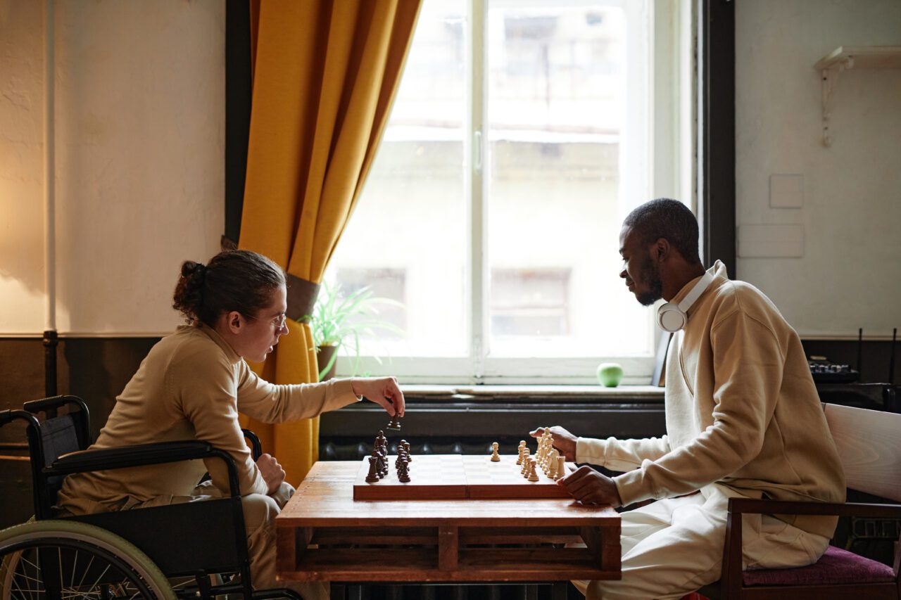 friends-playing-in-chess-e1698161837628